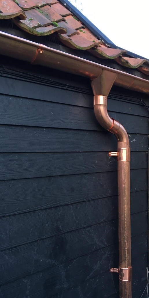 Copper Downpipe European Half-Round Gutters in Victoria, BC