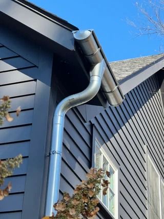 Aluminum European Half-Round Gutters and Downpipe in Victoria, BC